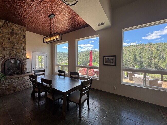 Photo - "Charming 4-Bed Oasis with 3 Full Baths and 2,275 Sq Ft of Comfort in Evergreen, CO!"