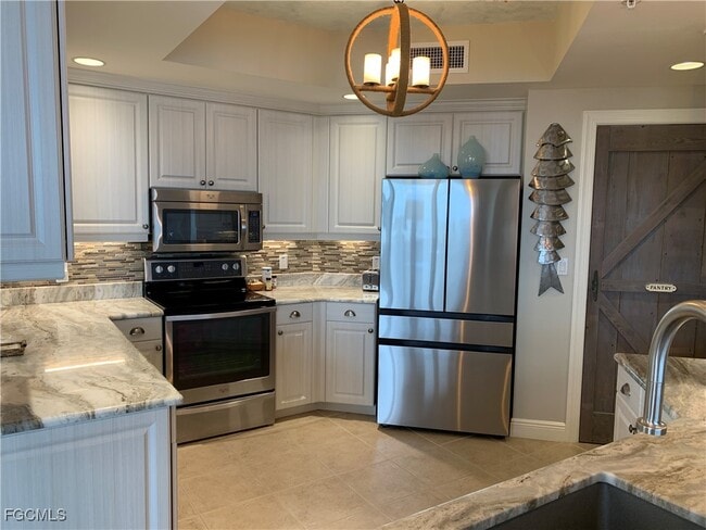 Building Photo - 2104 W First St Unit 1104