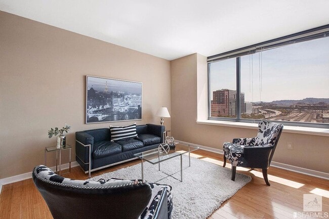 Building Photo - Spacious One-Bedroom Elegance in a Luxury Doorman Building with EV Parking Unit 741