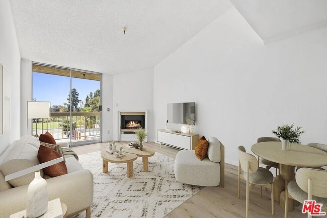 Building Photo - 5143 Bakman Ave Unit 201