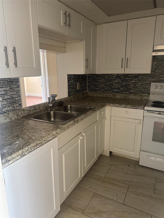 Photo - 7779 Tam Oshanter Blvd Unit 1-4