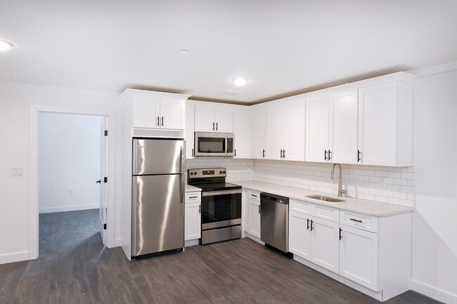 One Bedroom Kitchen - Broadway Plaza Lofts