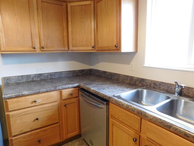 Photo - Charming 3 Bed, 2 Bath Townhome with Single-Car Garage