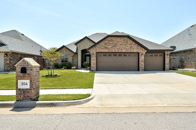 Building Photo - Stunning 4-Bedroom Home with 3-Car Garage ...