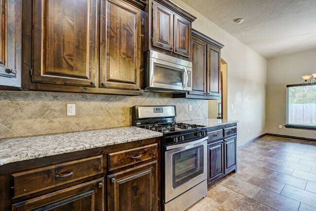 Photo - AVAILABLE THE END OF APRIL! 3 OR 4 BDRM, 2 BATHRM, 2 CAR & STORM SHELTER