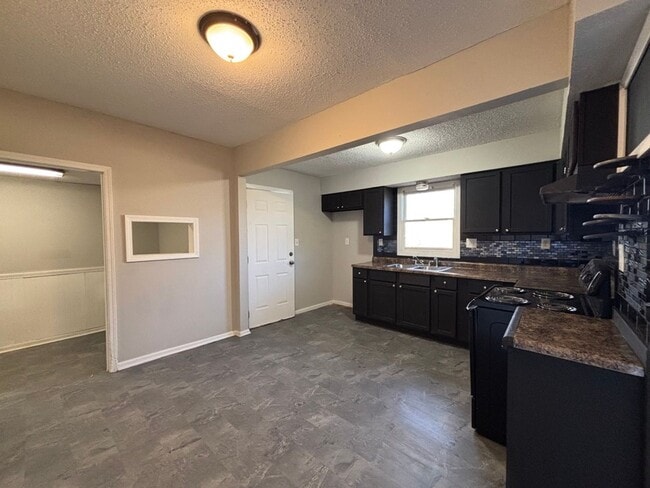 Photo - Spacious 2BR + Den with Huge Deck & Hardwood Floors