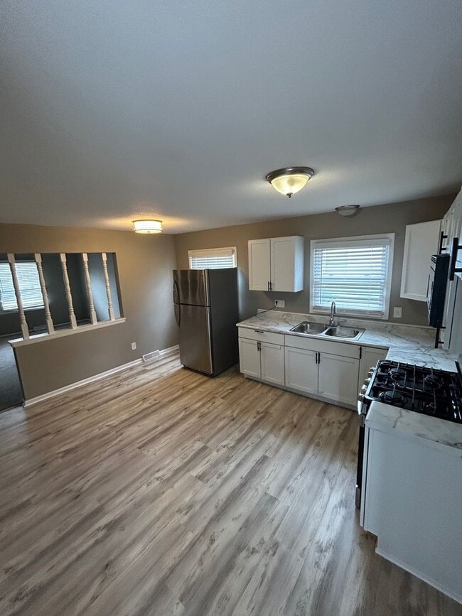 Building Photo - 6502 N 55th St Unit 6504 N 55th St