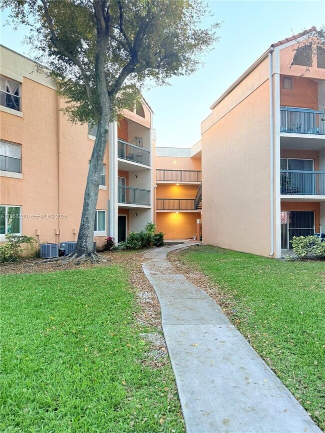 Building Photo - 6280 NW 186th St Unit 315