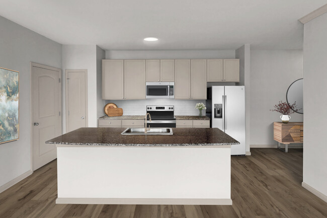 Upgraded kitchens with luxury vinyl plank flooring and sleek hardware - Chancery Village Apartments