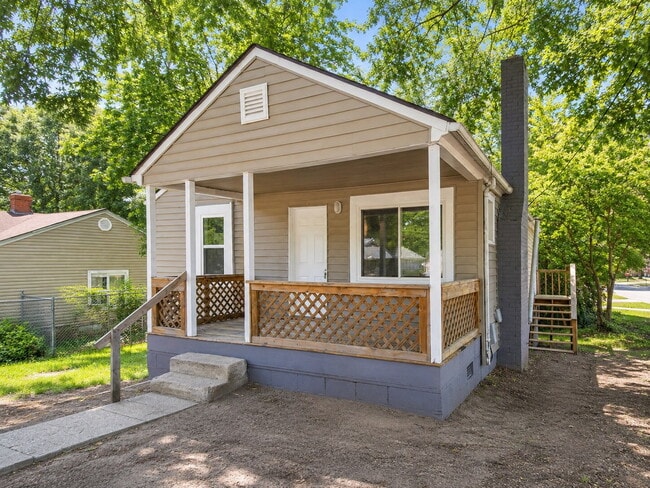 Photo - Bright 3-Bedroom Home with Covered Porch, Fireplace & Wooded Backyard