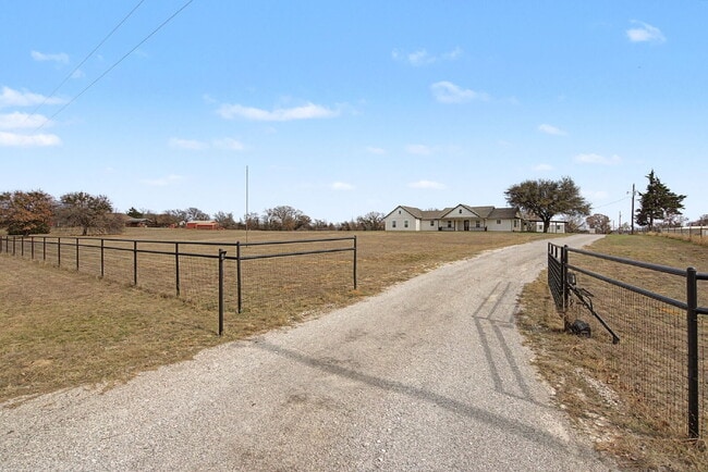 Photo - “4-Bedroom, 3-Bath Farmhouse Charm Meets Modern Luxury on a Serene 5-Acre Lot!”