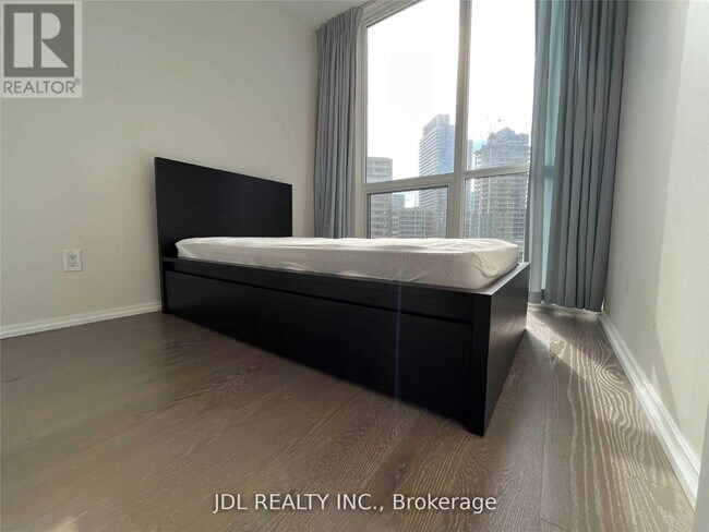 Photo - 45 Charles St E Unit 1702