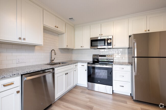 2BR, 2BA - 950SF - Kitchen - The Grotto