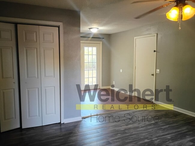 Photo - Charming 3-Bed Home with Fenced Yard and C...