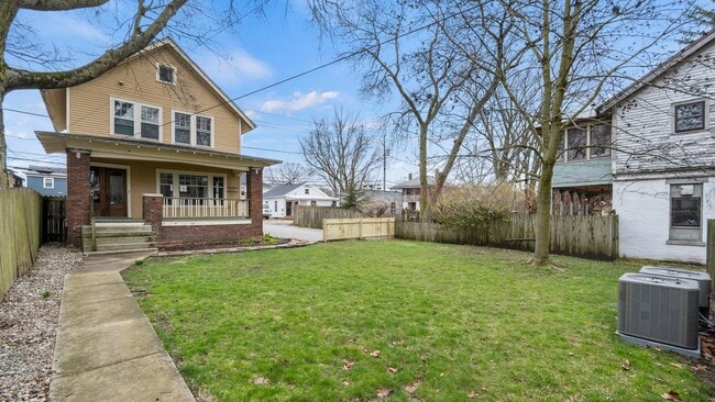 Photo - Single-family historic home in West Central with porch and private courtyard.
