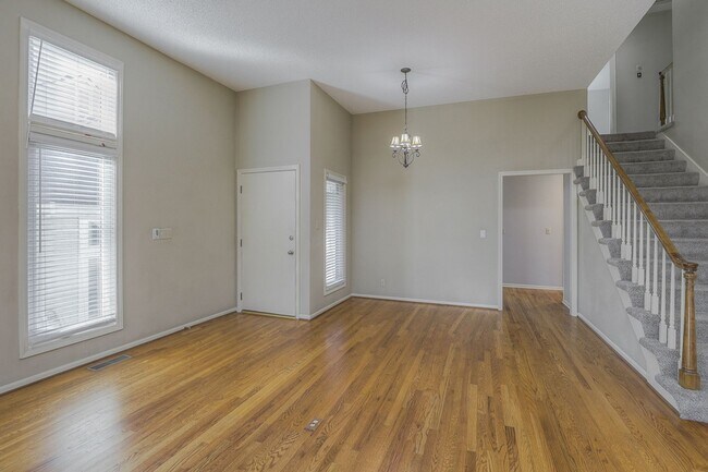 Photo - {11409} Updated Duplex in Fantastic Location + Two Car Garage + Main Level Master + Covered Deck