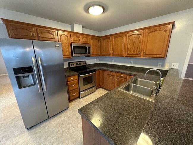 Photo - Spacious 4BR/3.5BA Two-Story Home in Queenswood Subdivision