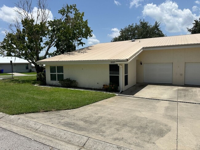Building Photo - Experience Maintenance-Free 55+ Living at The Cove at Tavares Village!
