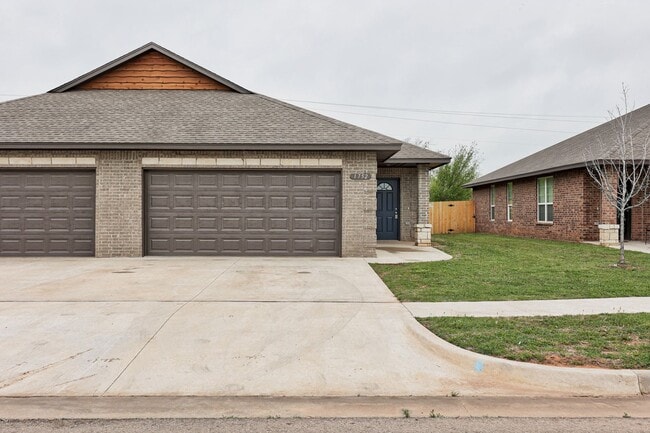 Photo - 3-Bed, 2-Bath Duplex with Waterway Views - Prime Location off I-40 in El Reno!
