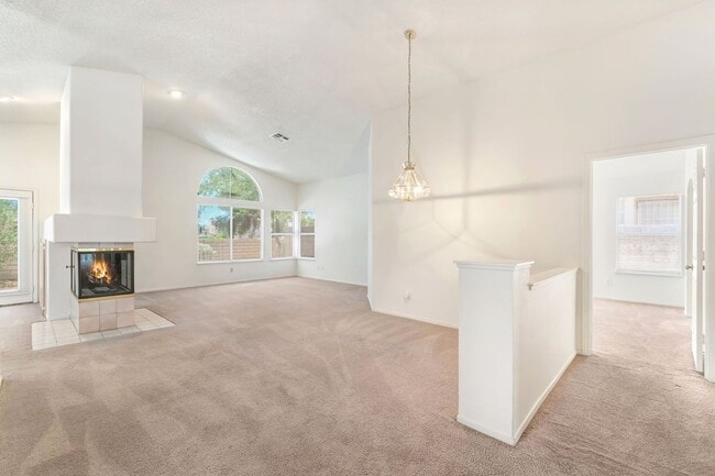 Photo - Vaulted Ceilings, Cozy Fireplace & Desirable Single-Story Living Near The Lakes!