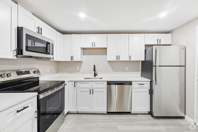 2BR, 1BA - 800SF - Kitchen - Iris Court Apartments