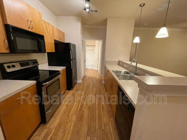 Photo - 8290 Gate Pkwy W Unit #1404