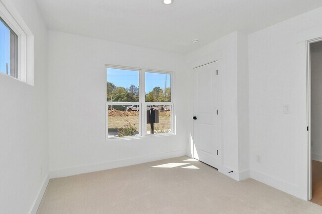 Photo - Brand new and stunning 4 bedroom townhome so close to it all!