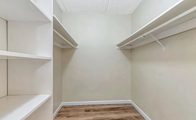 Photo - Spacious 1bdrm living room and bedroom with large picture windows bringing in lots of natural light.