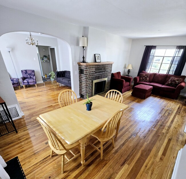 Two living spaces and a dining room - 205 Harvard Dr SE House