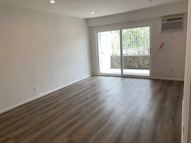 living room - 1223 S Bundy Dr Apartments Unit 101