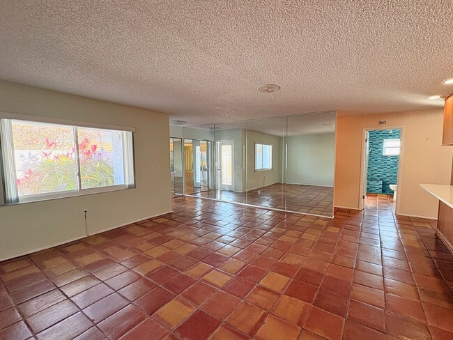 Photo - 3 Bed 2 Bath Home with Large Fenced Backyard & Screened Lanai — Available Now