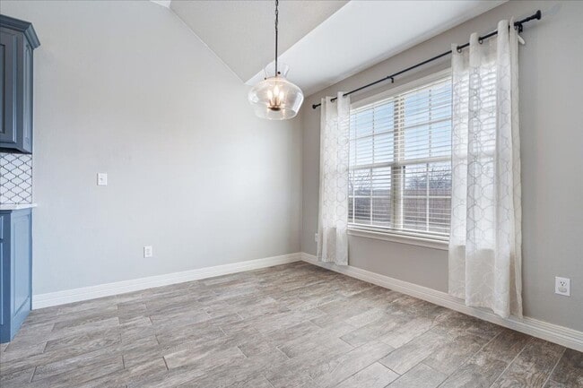 Photo - Discover this spacious 4-bedroom, 2-bath home