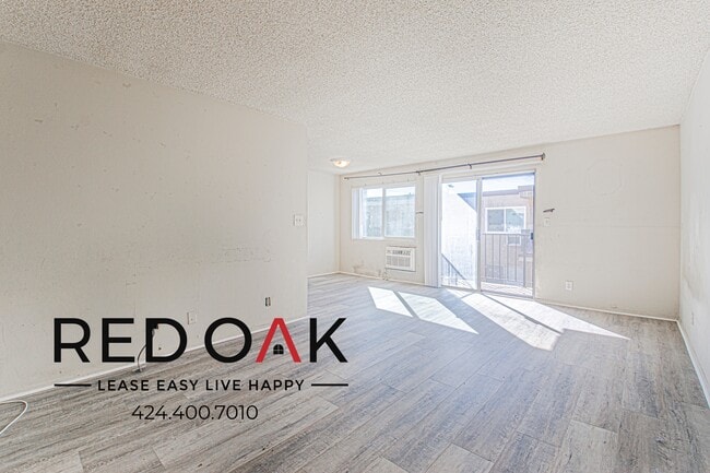 Building Photo - 14255 Tyler St Unit 205