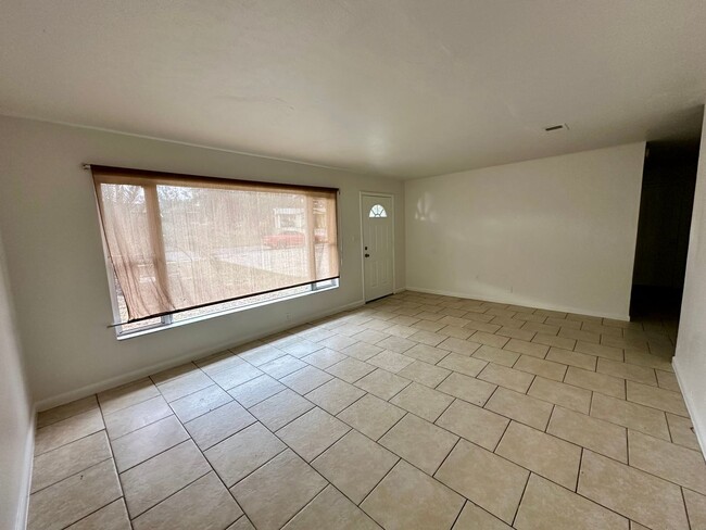 Photo - Charming 3-Bedroom, 1.5-Bathroom Home with Stunning Lake Views