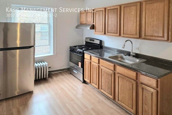 Building Photo - 3057 W Argyle St Unit 3057-2 Rental