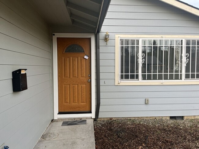 Photo - Charming Single-Level Home Featuring New Hardwood Floors, Bright Bedrooms & Open-Concept Living