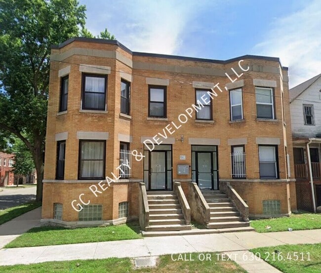 Building Photo - 6401 S Eberhart Ave Unit 1
