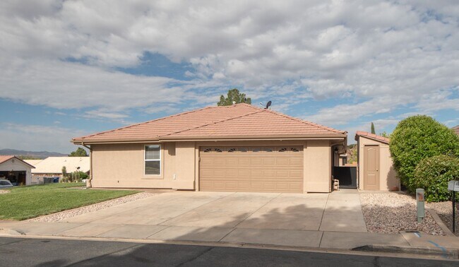 Photo - Spacious 3-Bedroom Home with Incredible Garage & Prime Location!