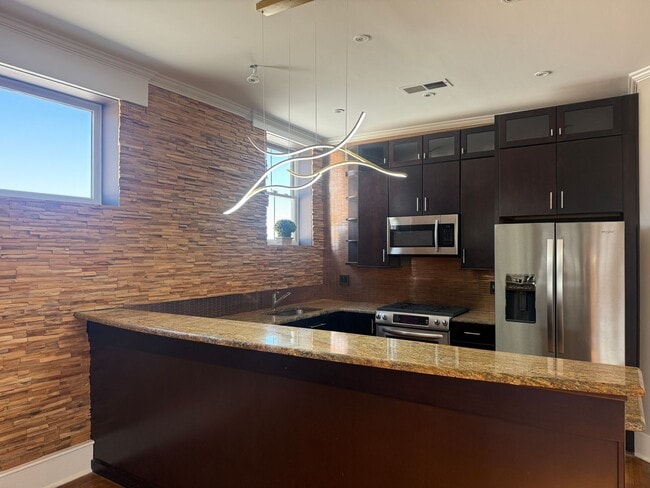 Photo - Completely Renovated Downtown Memphis Loft with Rooftop Skyline Views.