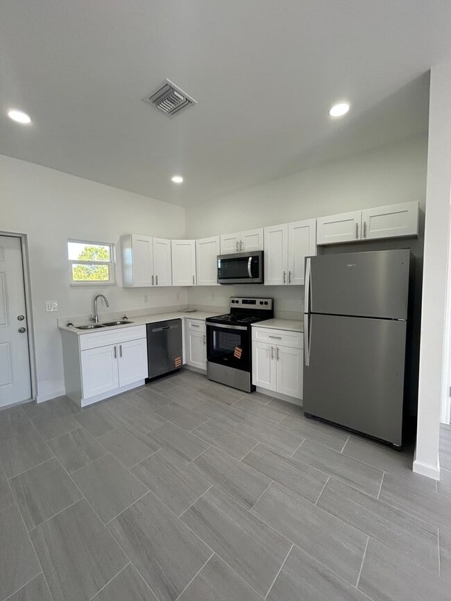 Photo - Brand-New Modern 2BR/2BA Home with Garage – Desirable Lake Placid Location