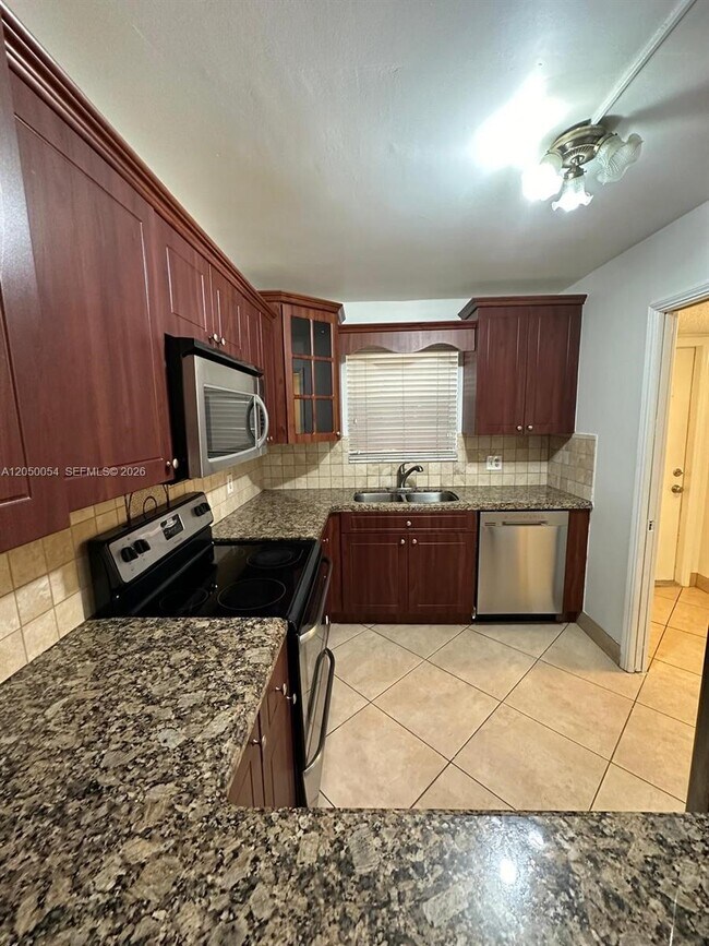 Photo - 9410 Live Oak Pl Unit 305