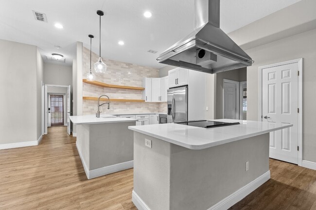 Lake Life Near Lake Nona – 4BR Home with Quartz Kitchen, Gas Fireplace & Private Backyard