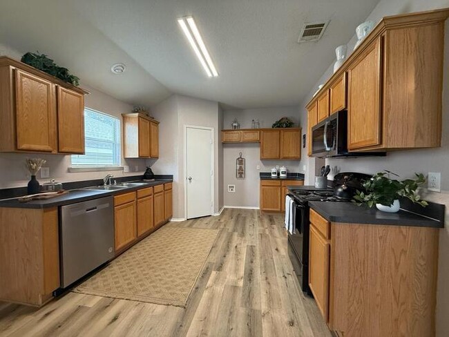 Photo - charming 3-bedroom, 2-bath home located in the highly sought-after Sendera Ranch community.