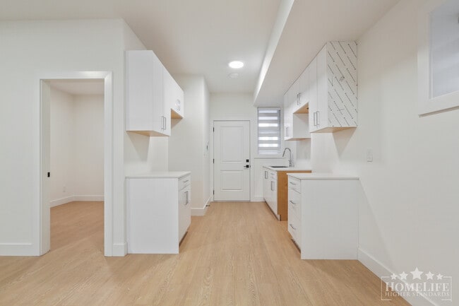 Photo - Modern 2-Bedroom Basement Suite on 16th Av... Unit Basement