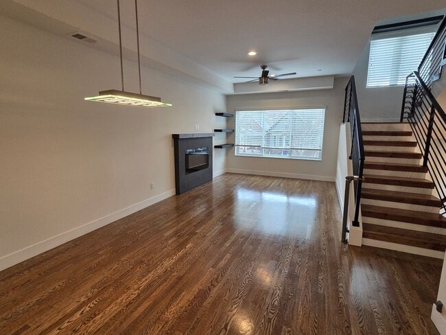 Photo - STUNNING 4-LEVEL TOWNHOME IN HIGHLANDS WITH SAUNA, 2-CAR GARAGE + AMAZING ROOFTOP DECK!