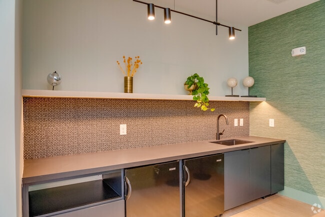 Club Room with Chef ’s Kitchen & Bar Area