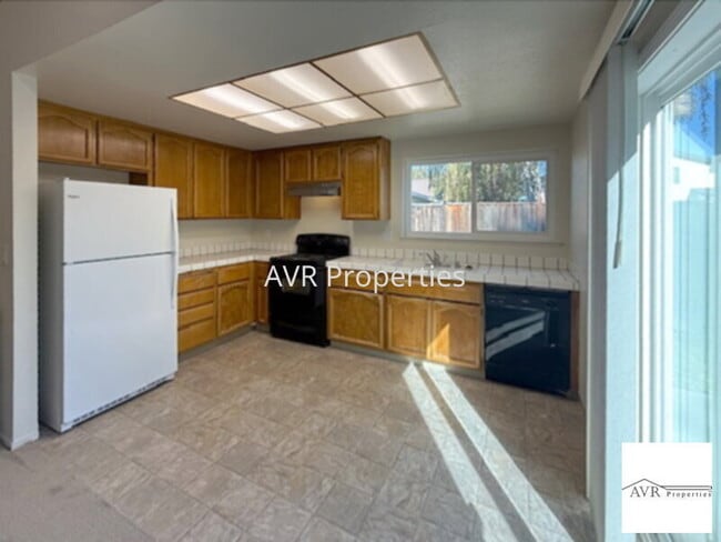 Photo - Gorgeous backyard with new carpets and paint