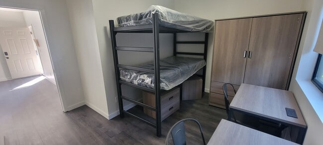 Photo - Double Bed Unit - Right Corner-: Entirely ... Unit D - Room 5