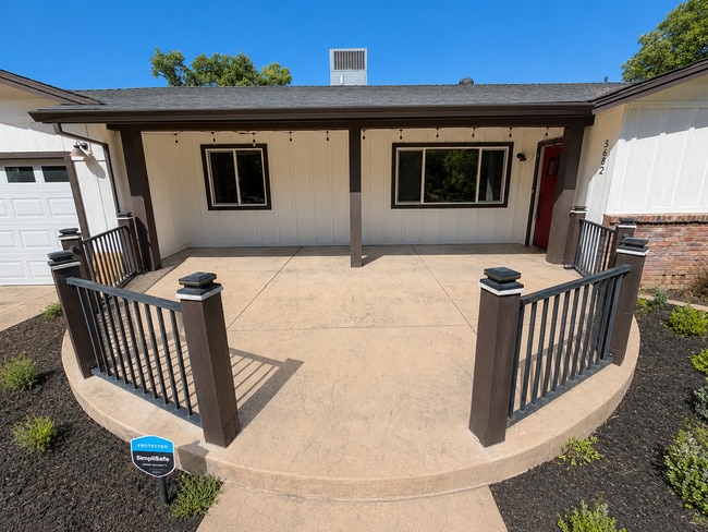Photo - Private 3BR Home on Approx. 1 Acre | Huge Fenced Yard, Sunroom & 2-Car Garage