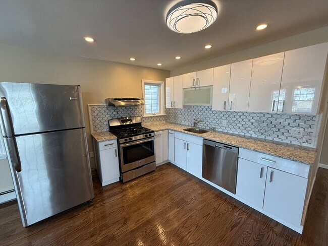 Photo - Mint 2 Bed/2 Bath Single-Family Home in Howard Beach!